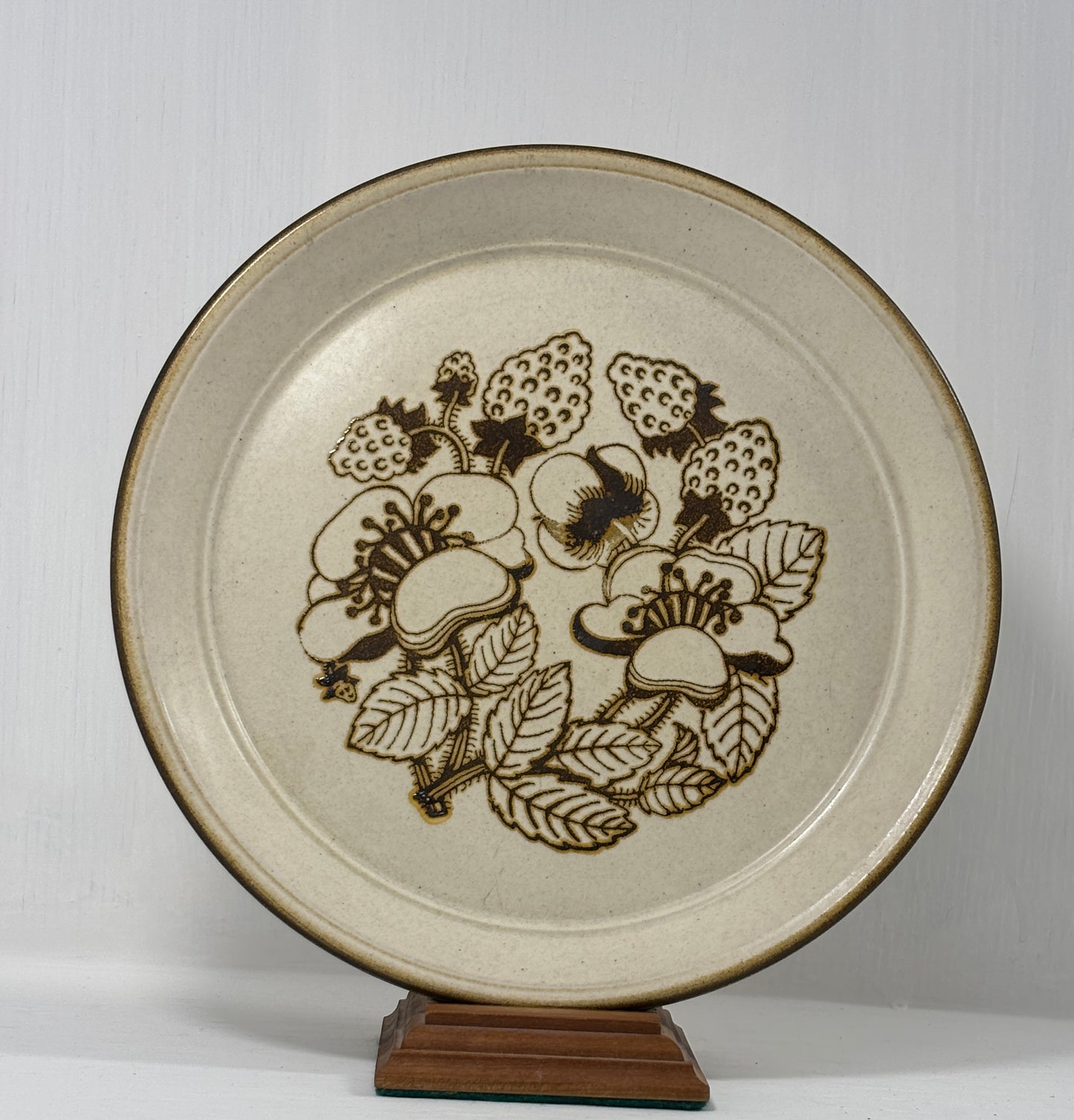 Ceramic plate with floral design on a white background