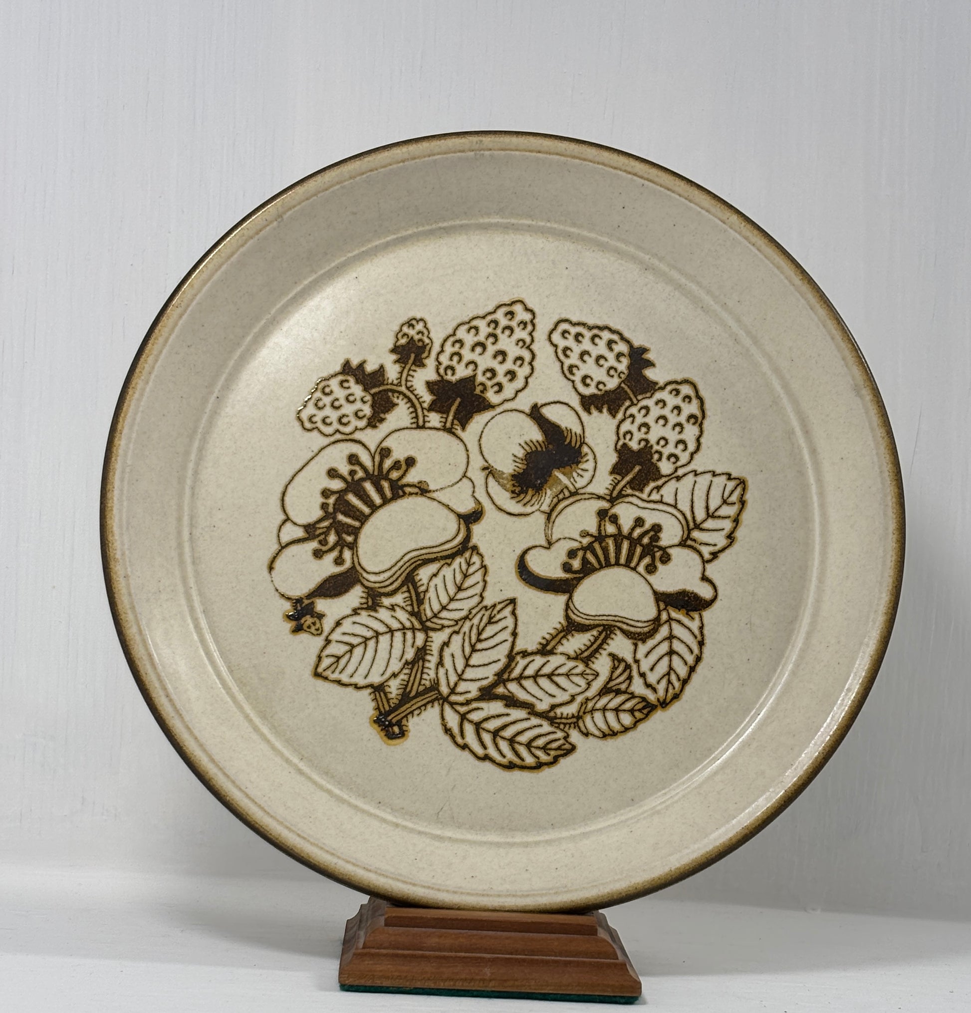 Ceramic plate with floral design on a white background