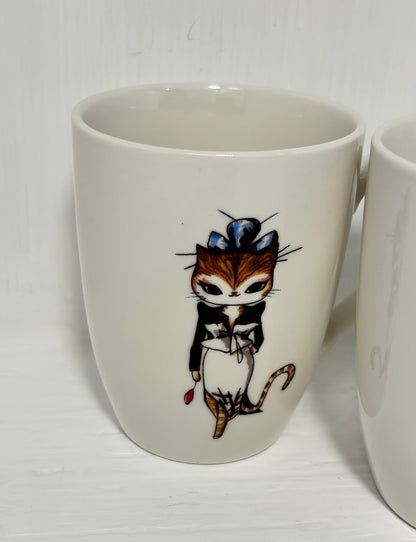 White mug with a cat illustration on a white background