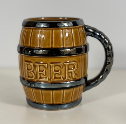 Brown mug shaped like a barrel with 'BEER' text on a white background