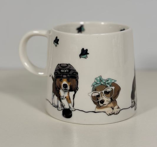 White mug with illustrations of dogs wearing a helmet and sunglasses on a gray background