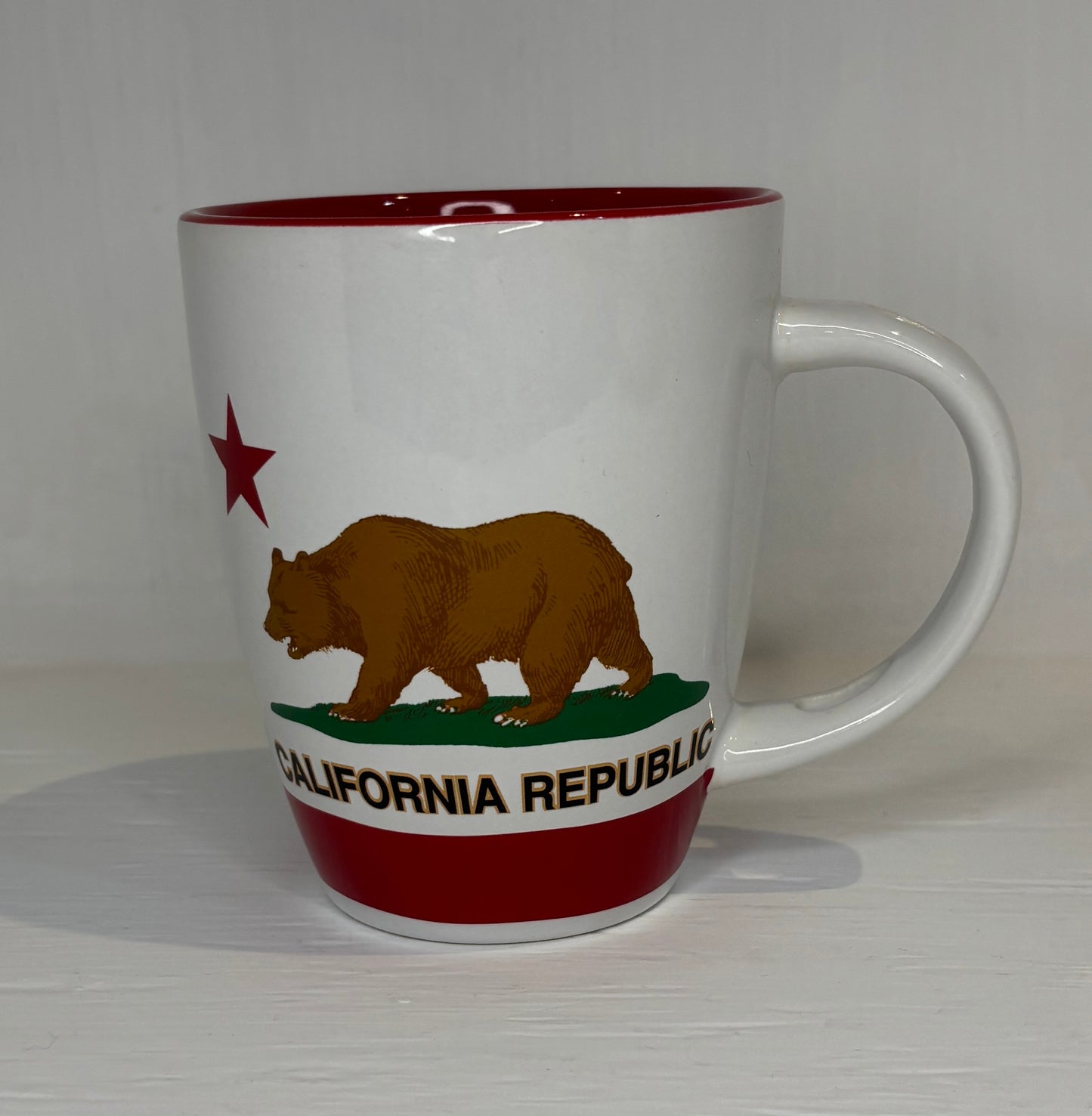 White mug with California Republic design featuring a bear and star on a white background
