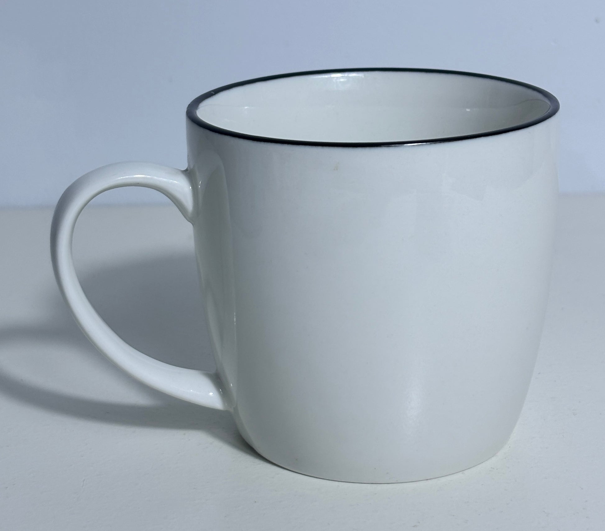Abbott Peering Cat Coffee Mug