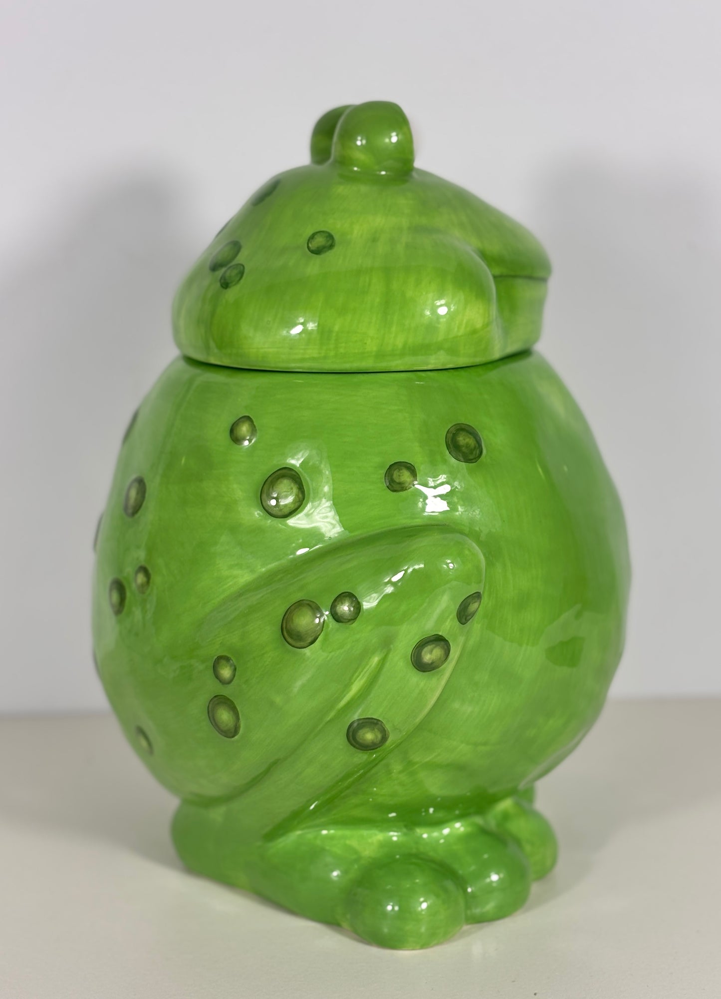 Bella Casa by Ganz Cross Eyed Frog Cookie Jar