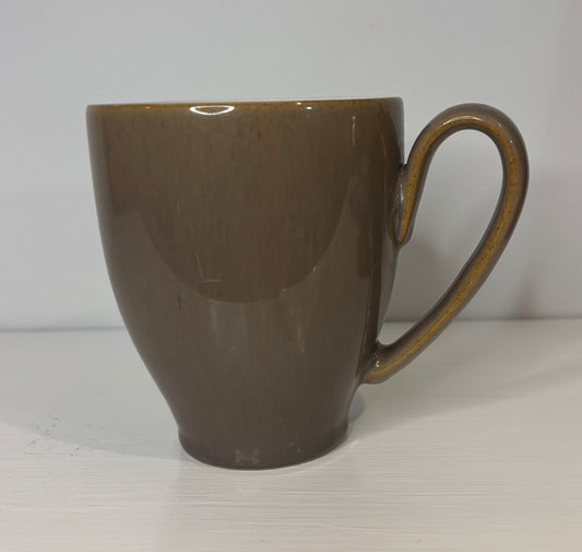 Brown ceramic mug on a white background