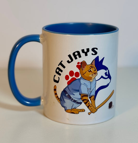 Mug with 'Cat Jays' design featuring a cat in a sports uniform on a white background