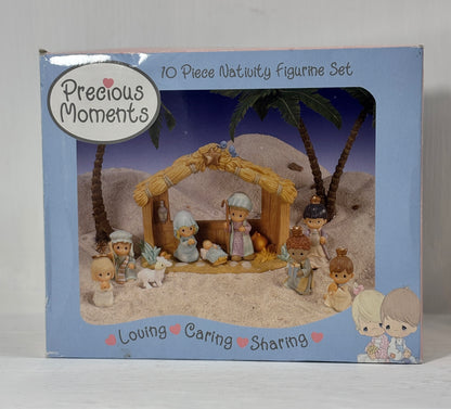 Boxed 10-piece Nativity figurine set with 'Precious Moments' branding on a neutral background.