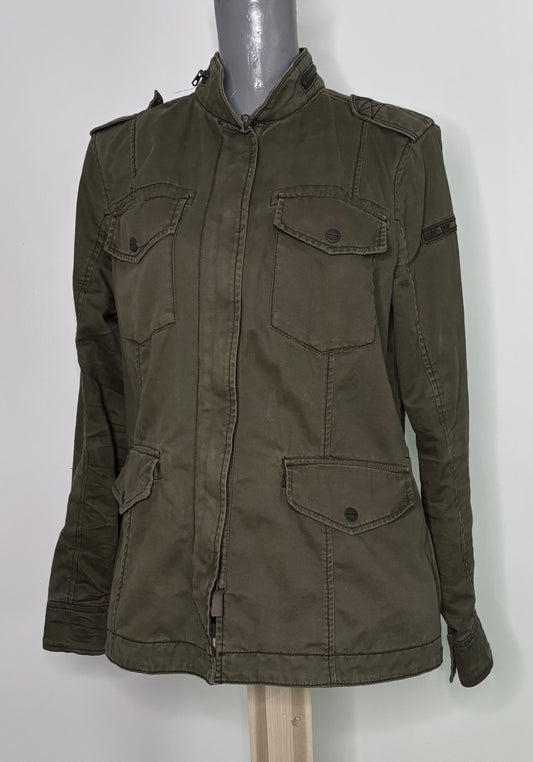 Green jacket on a mannequin against a white background