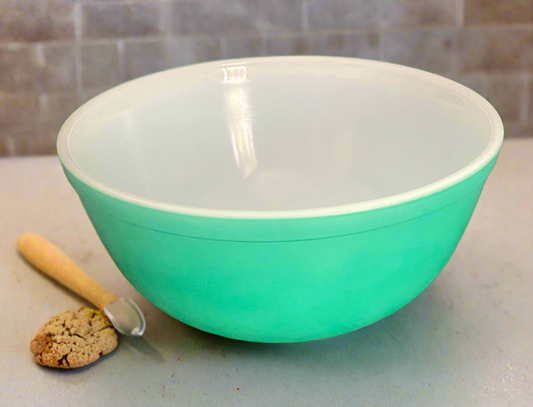 green bowl used for mixing recipes