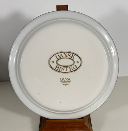 White plate with 'Dansk Bistro' logo on a white background