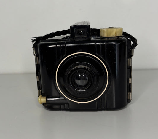 Vintage black camera with a white background