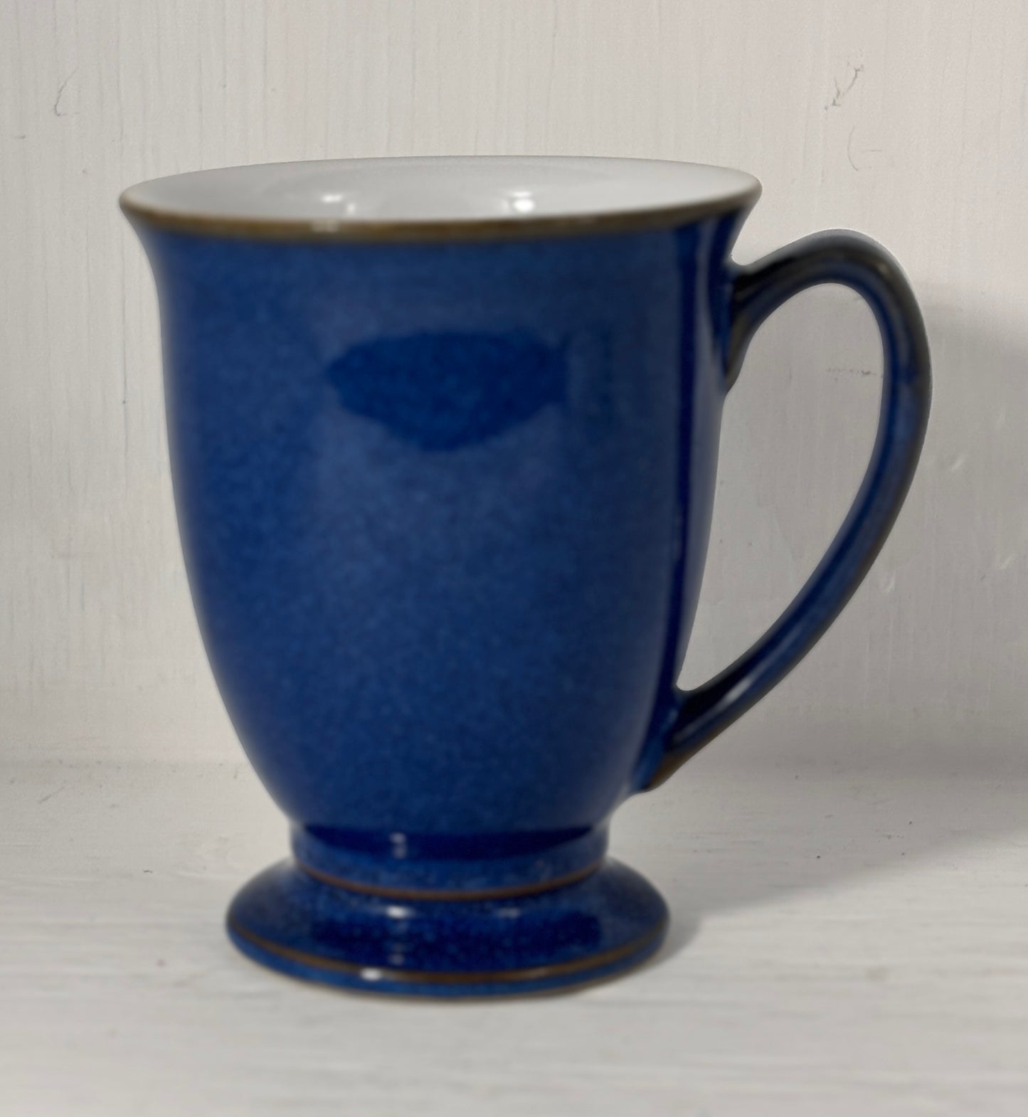 Blue blue mug on a white background