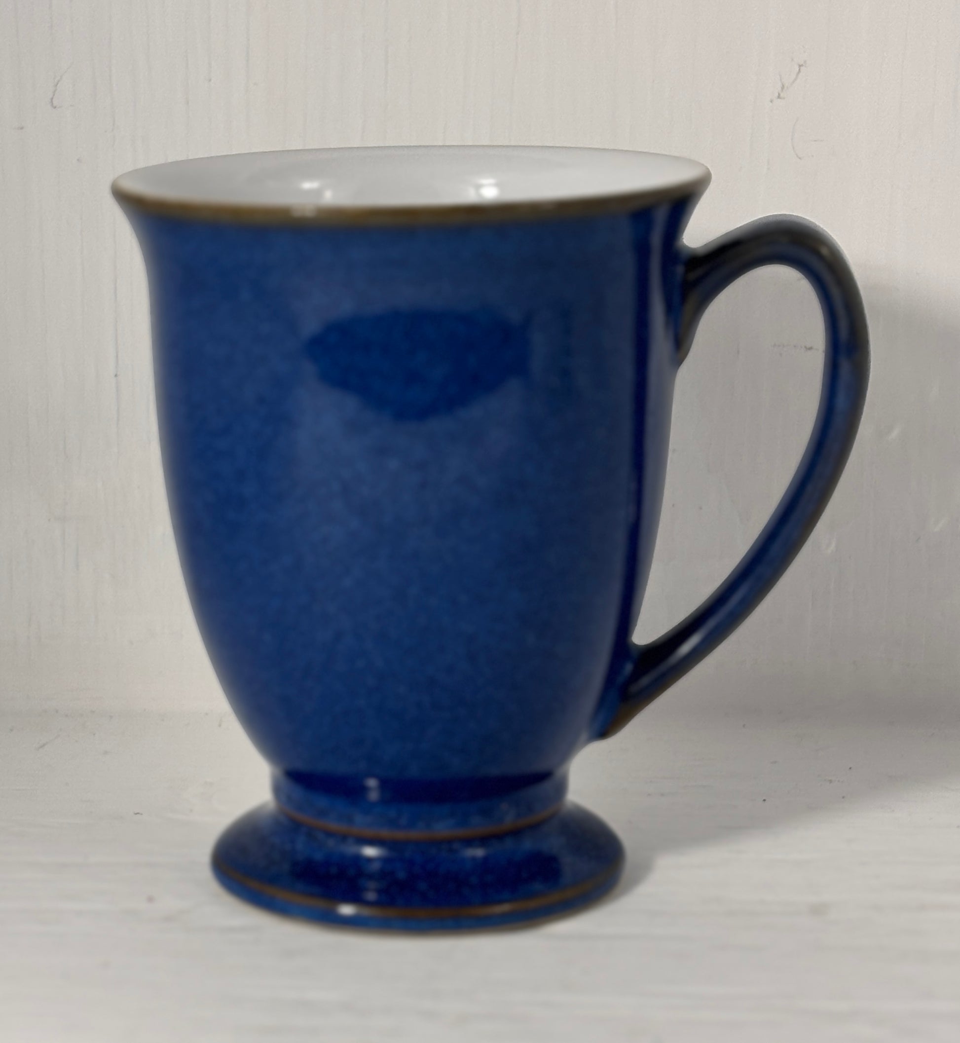 Blue blue mug on a white background