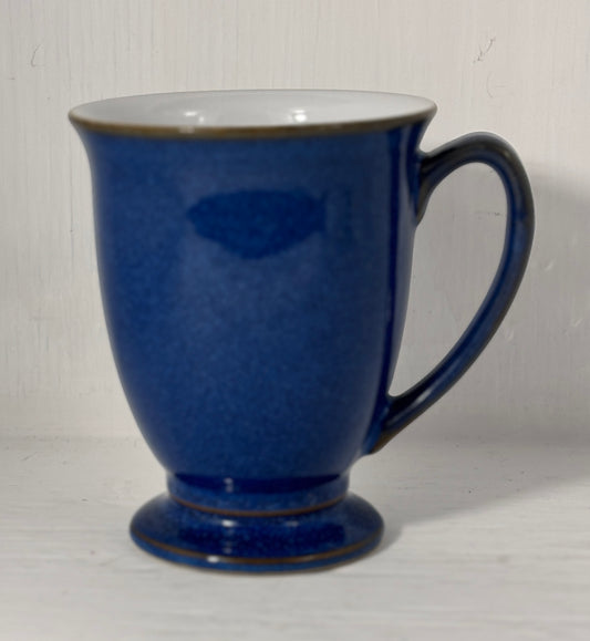 Blue blue mug on a white background