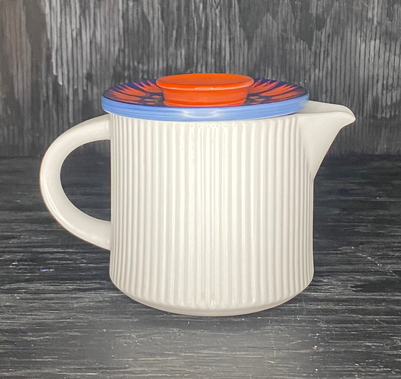 Thomas Rosenthal Orange and Blue Flower Creamer