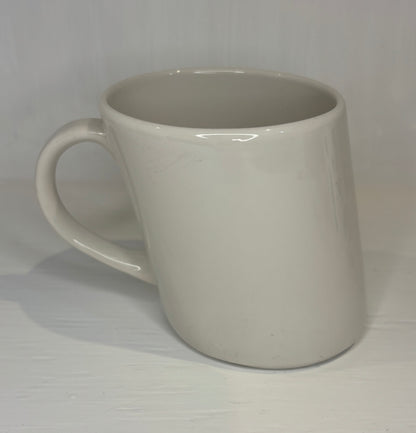 White ceramic mug on a white background