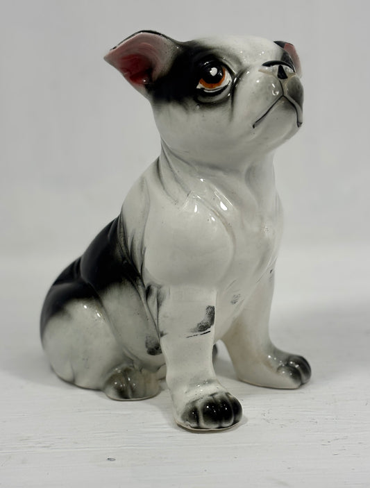 Ceramic bulldog figurine on a white background