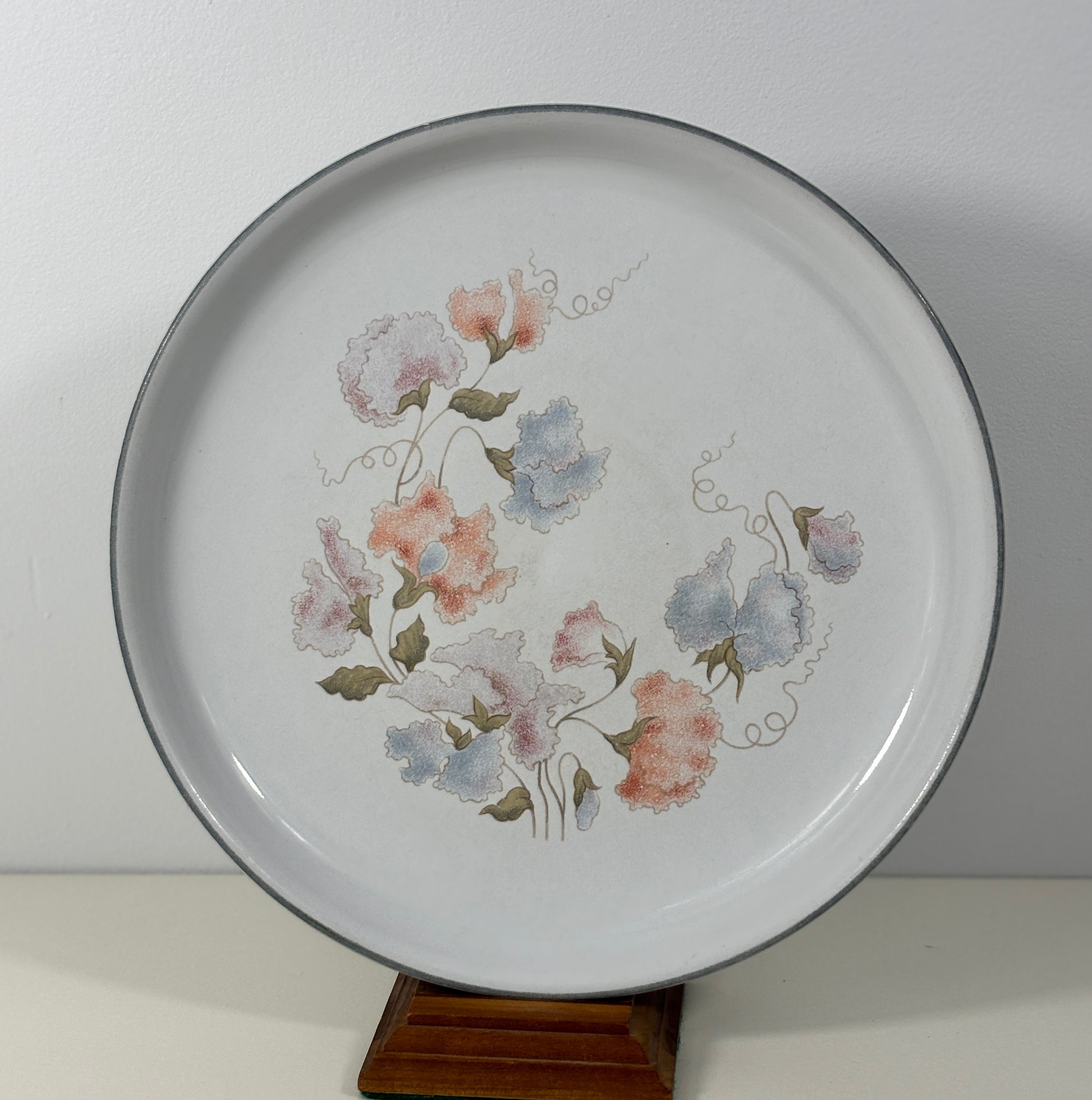 plate with floral design on a white background