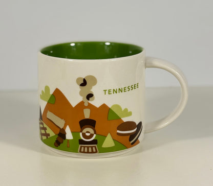 Mug with Tennessee-themed design on a white background