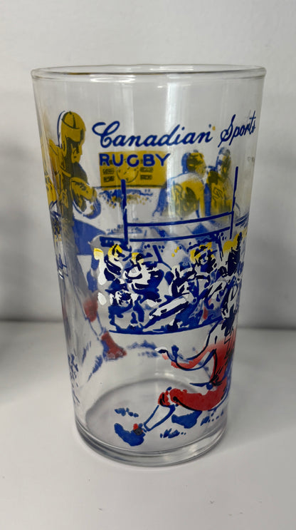 Glass tumbler with rugby-themed design and 'Canadian Sports Rugby' text on a white background