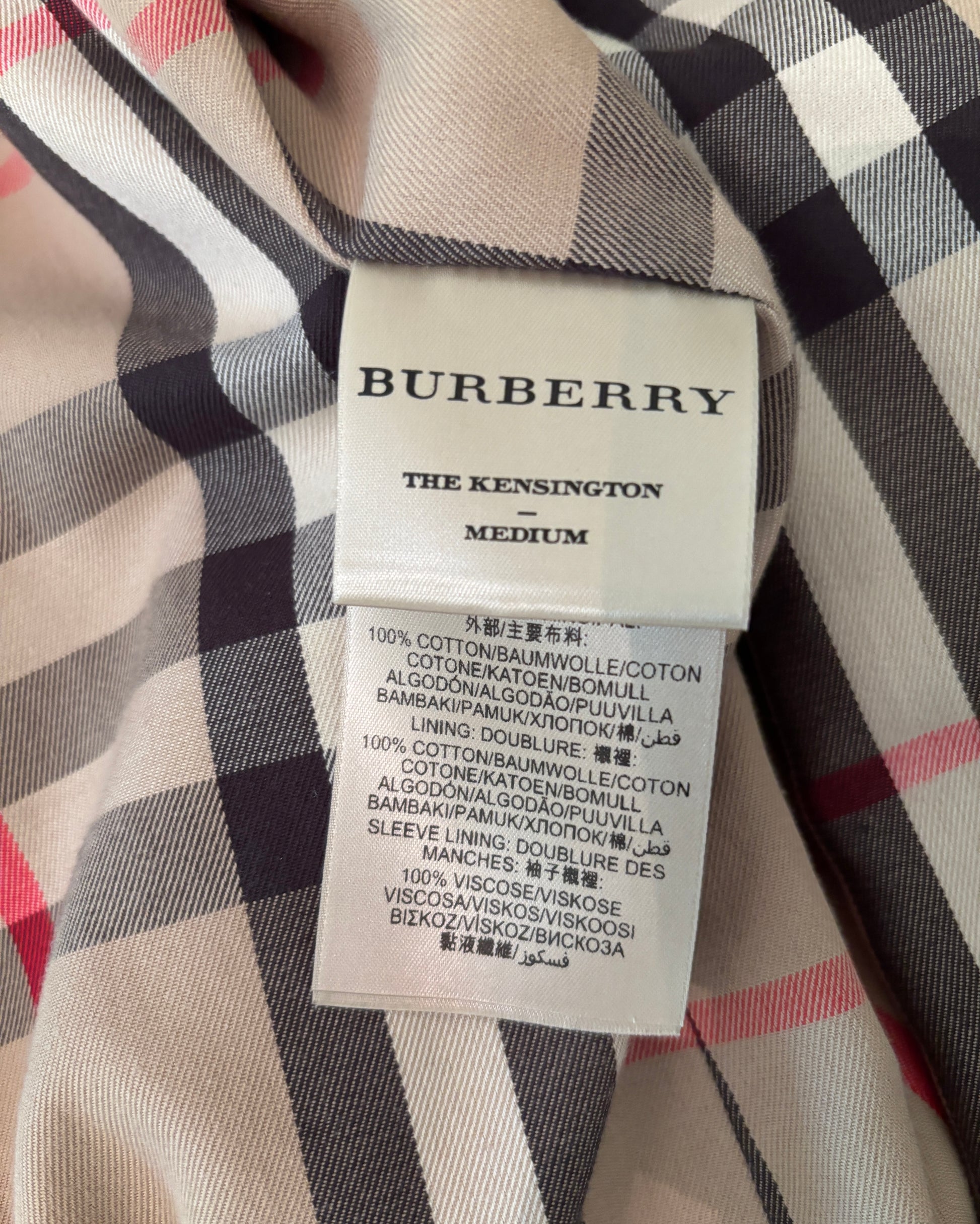 Burberry label on a checkered fabric background