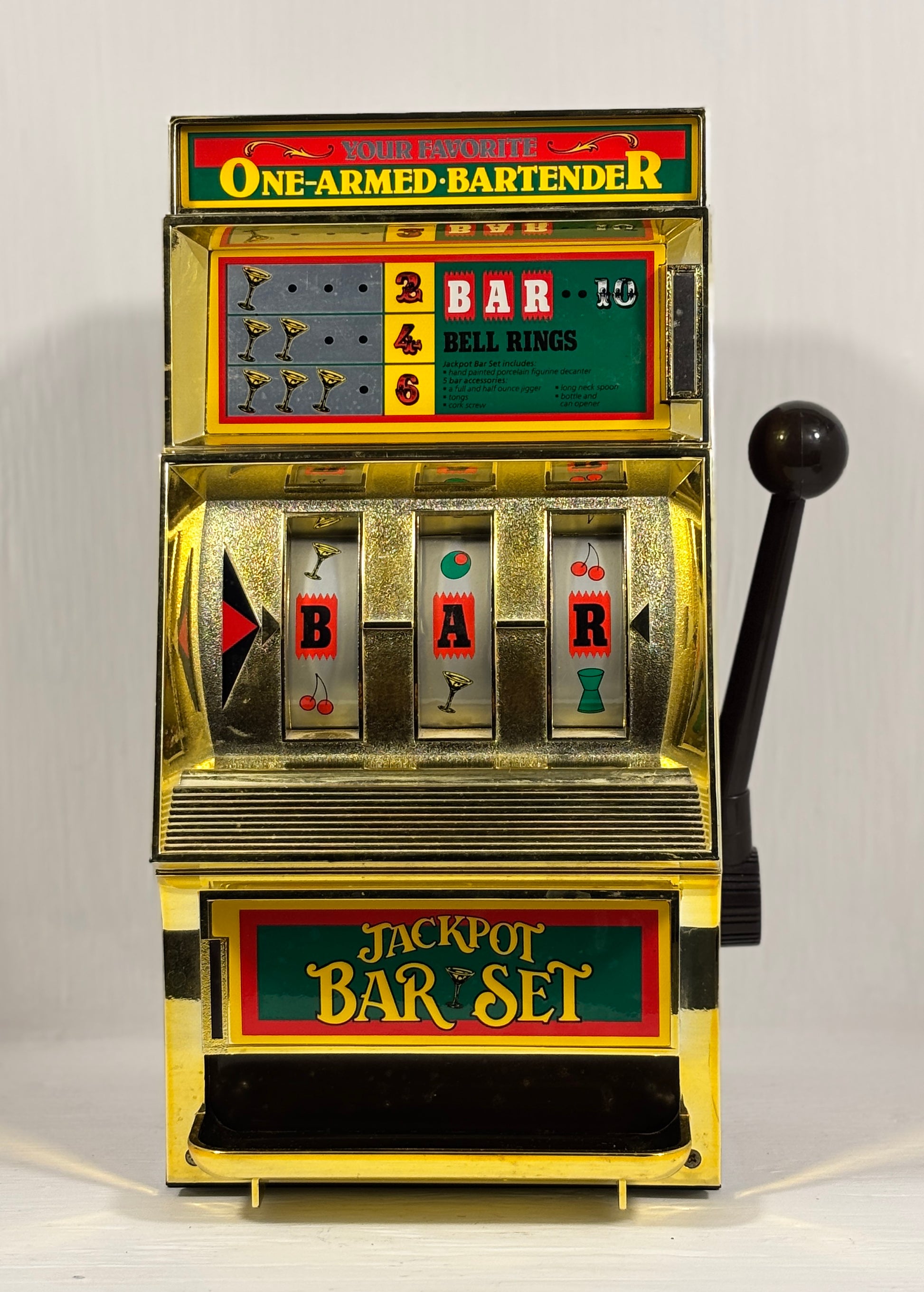 Vintage slot machine model 'One-Armed Bartender' on a white background