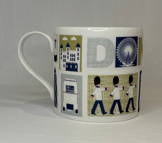Mug with London-themed design featuring iconic landmarks on a white background