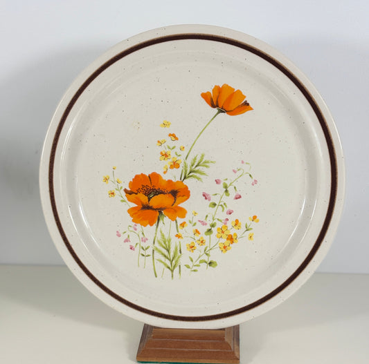 Ceramic plate with floral design on a white background