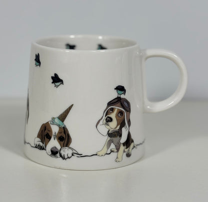 White mug with illustrations of dogs wearing hats and hats on a white background