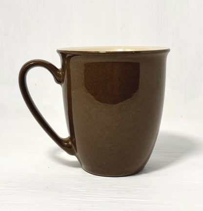 Brown mug on a white background
