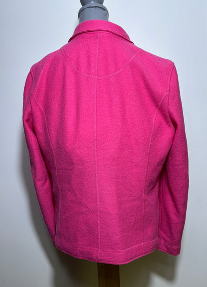 Pink jacket on a mannequin against a white background