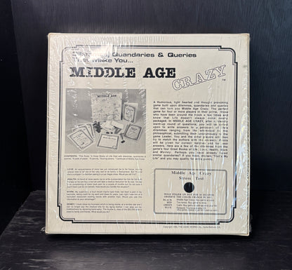 Product packaging for 'Middle Age Crazy' with text and images on a dark background