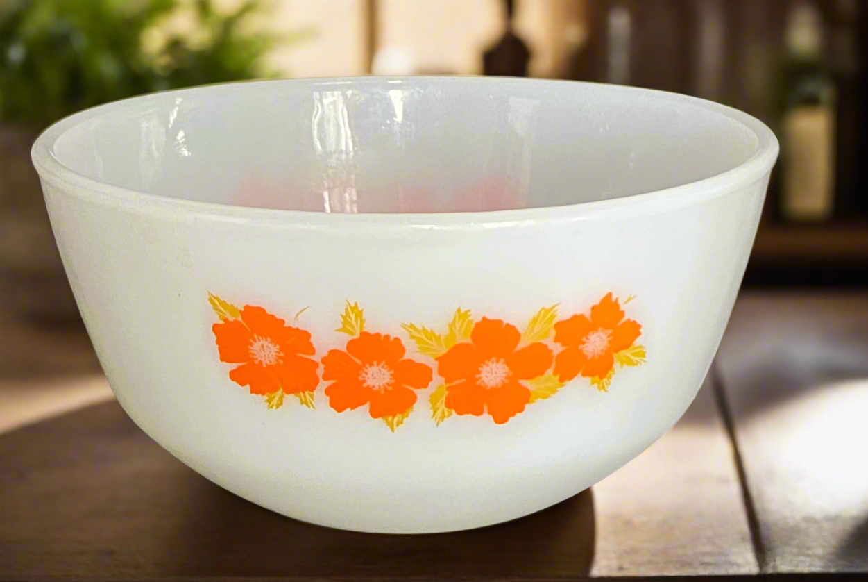 white bowl with orange flowers