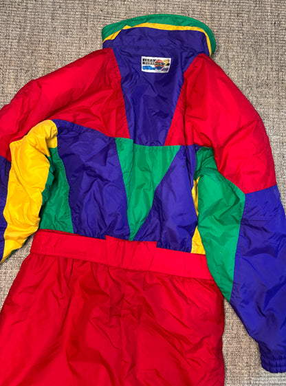Colorful jacket with a visible brand label on a textured surface