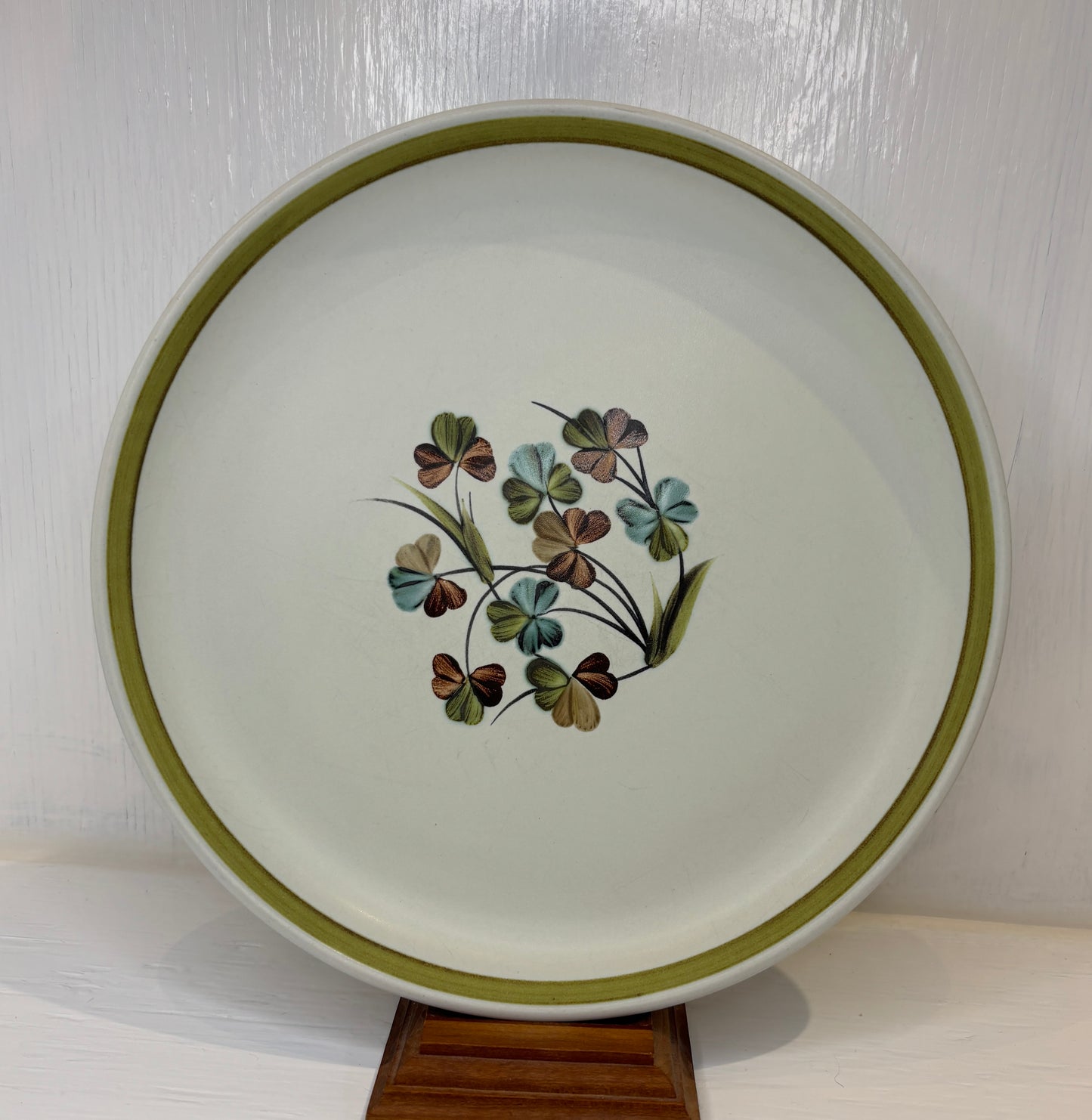 Ceramic plate with floral design on a white background