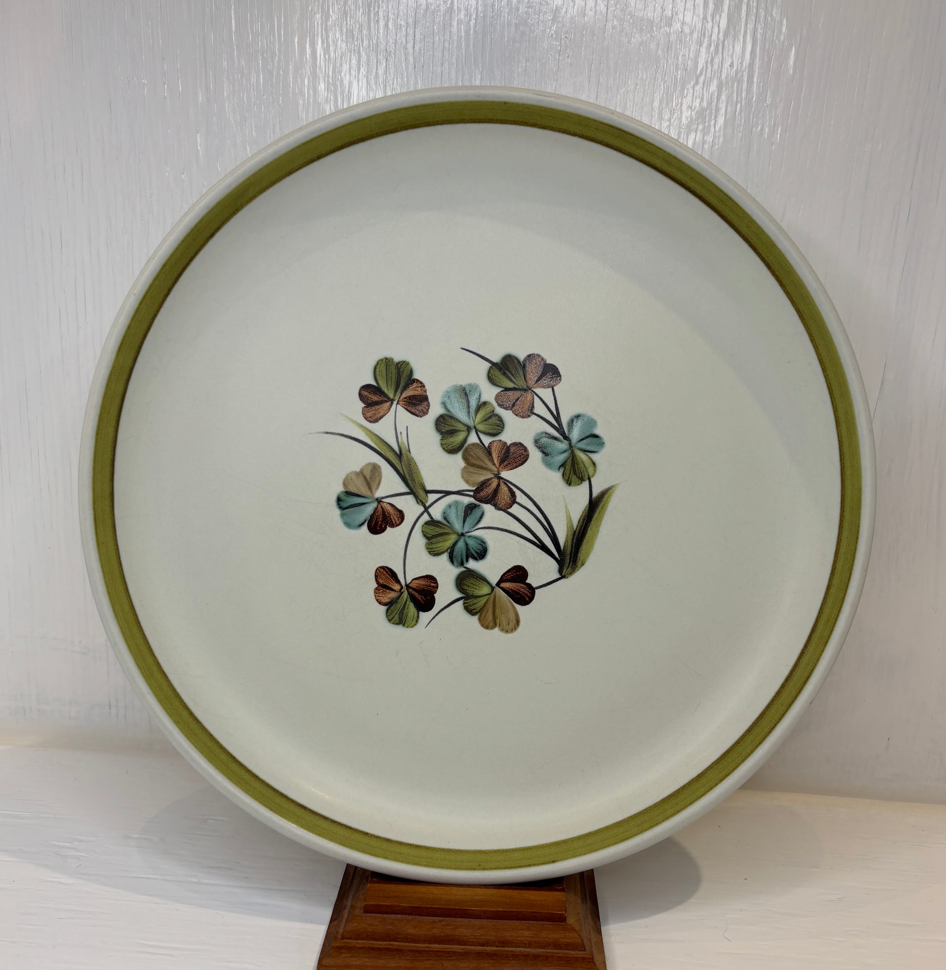 Ceramic plate with floral design on a white background