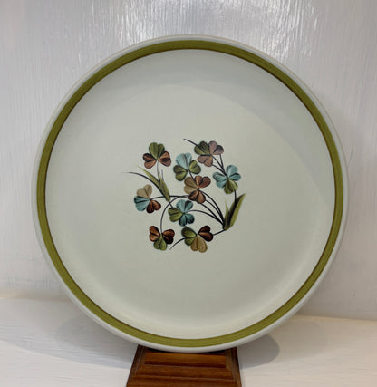Ceramic plate with floral design on a white background