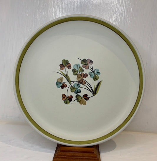 Ceramic plate with floral design on a white background