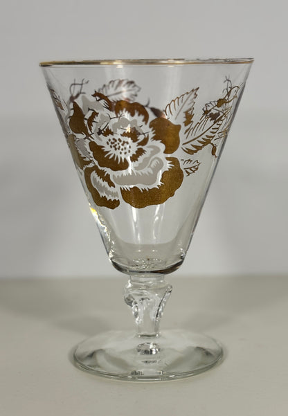 Decorative glass with floral pattern on a plain background