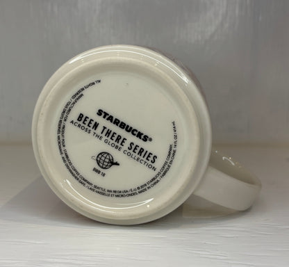 Starbucks mug with 'Been There Series' text on a white background