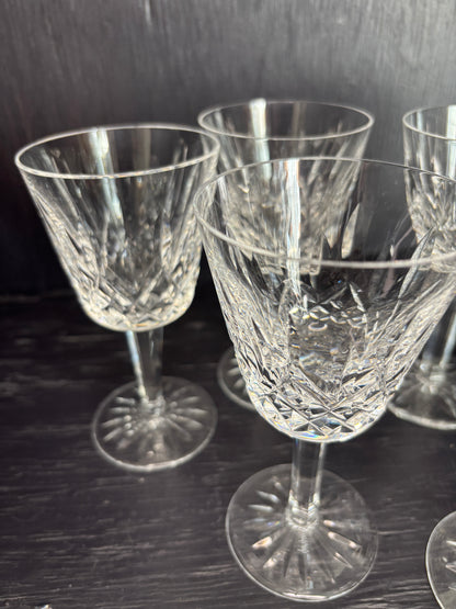Set of crystal glasses on a dark surface