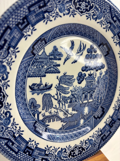 Blue and white ceramic plate with intricate patterns