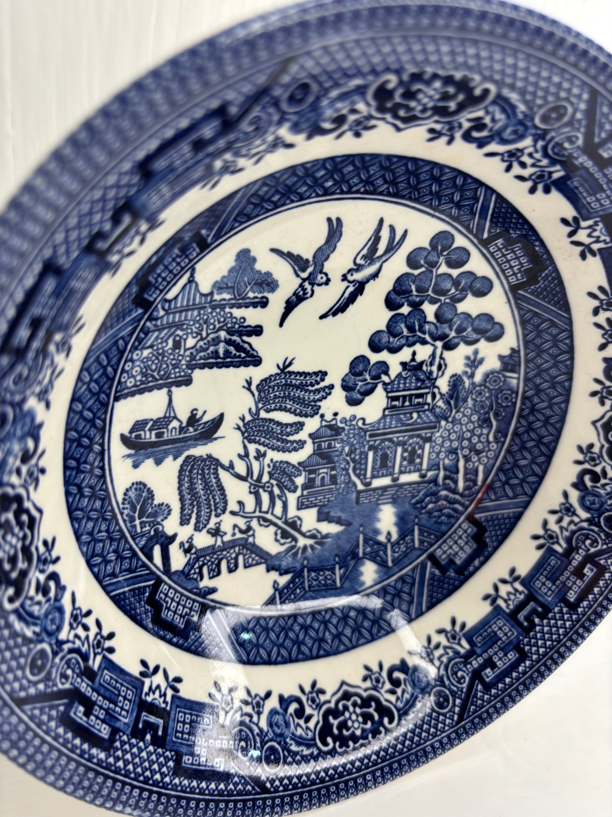 Blue and white decorative plate with intricate patterns