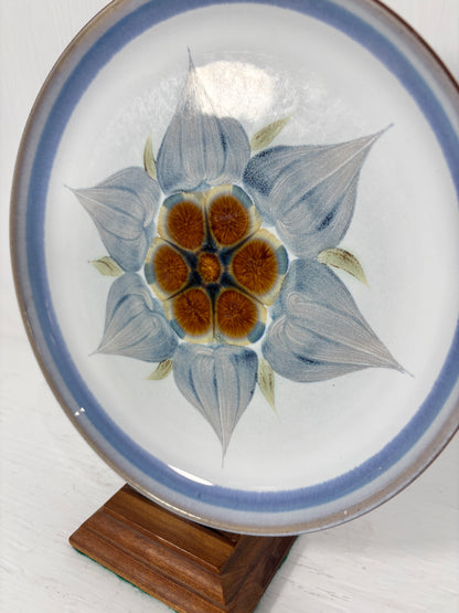 Ceramic plate with floral design on a white background