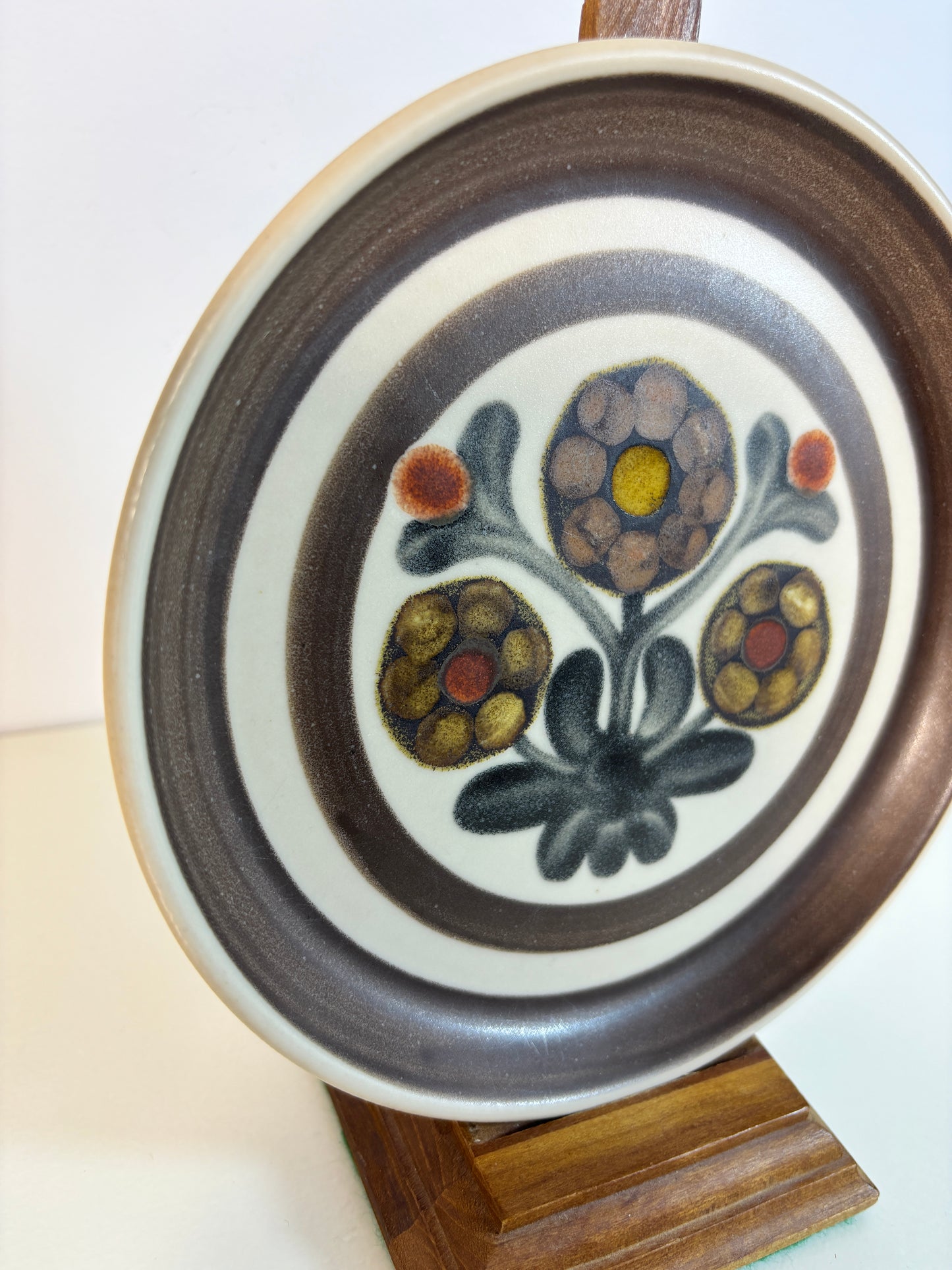 ceramic plate with floral design on a white background