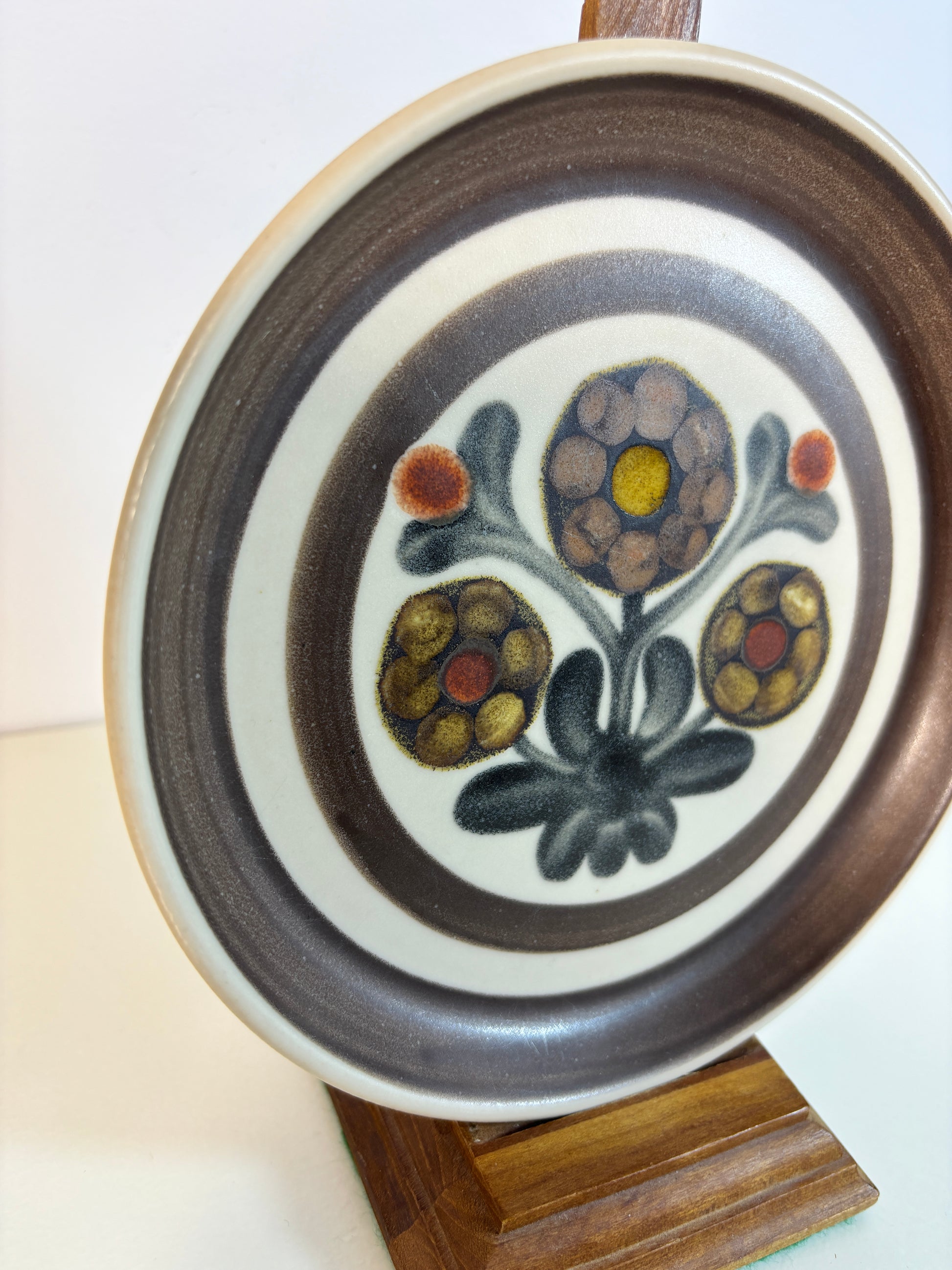 ceramic plate with floral design on a white background