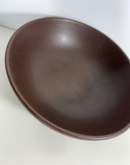 Brown bowl on a white background