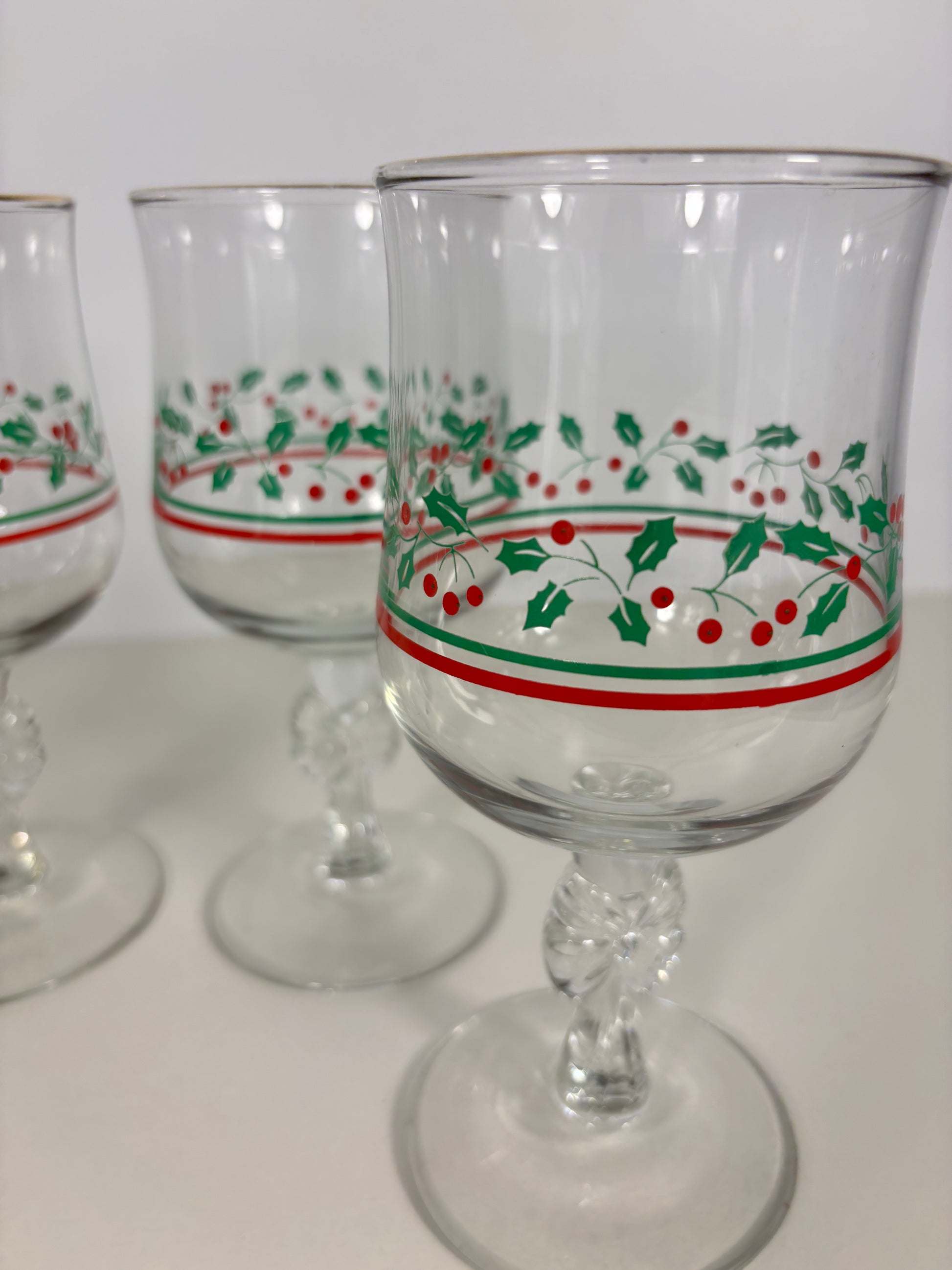 Clear glass with holly design on a white background