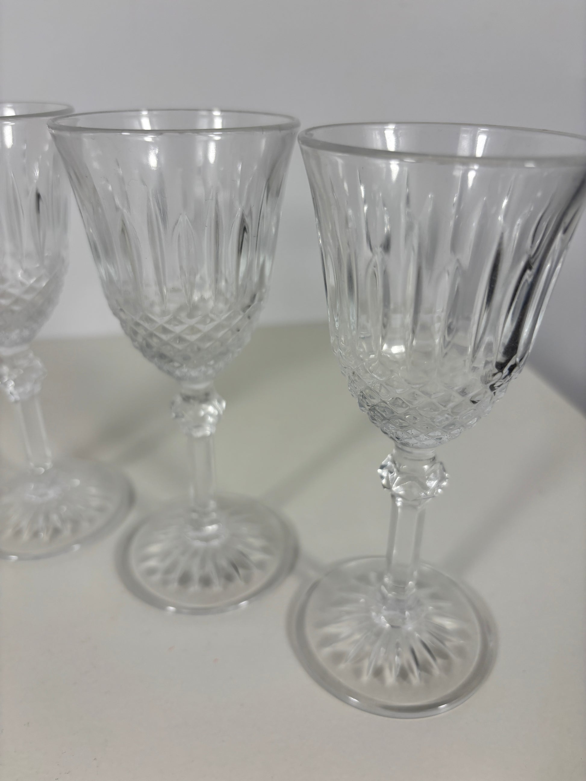 Clear glassware set on a white surface