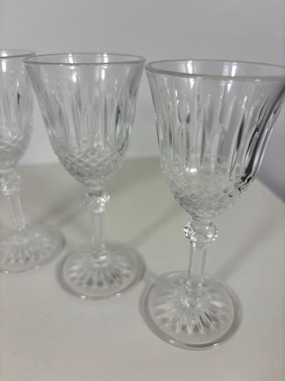 Clear glassware set on a white surface